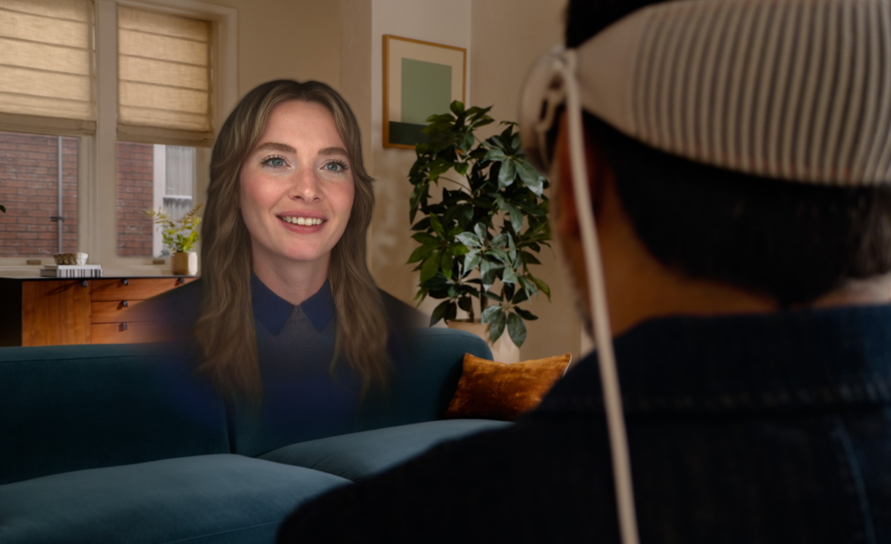 People connecting through FaceTime and Personas in Apple Vision Pro.